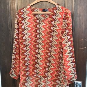 The limited tunic sheer blouse